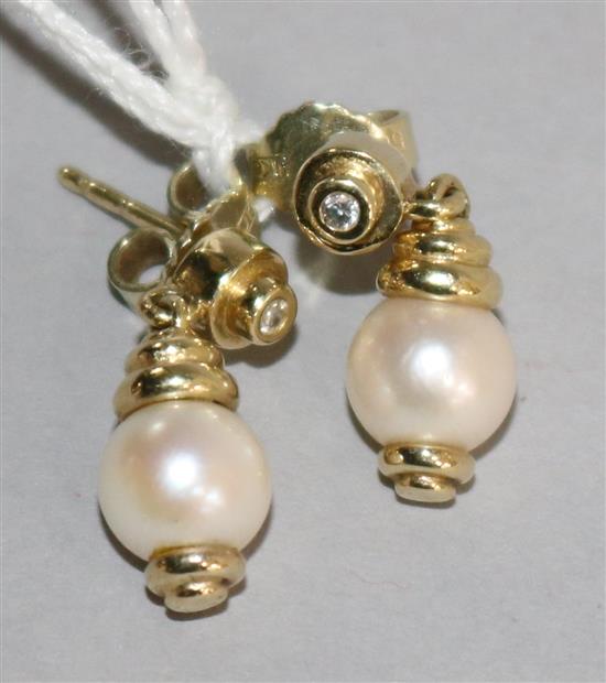 A pair of 14ct gold, cultured pearl and diamond ear studs.